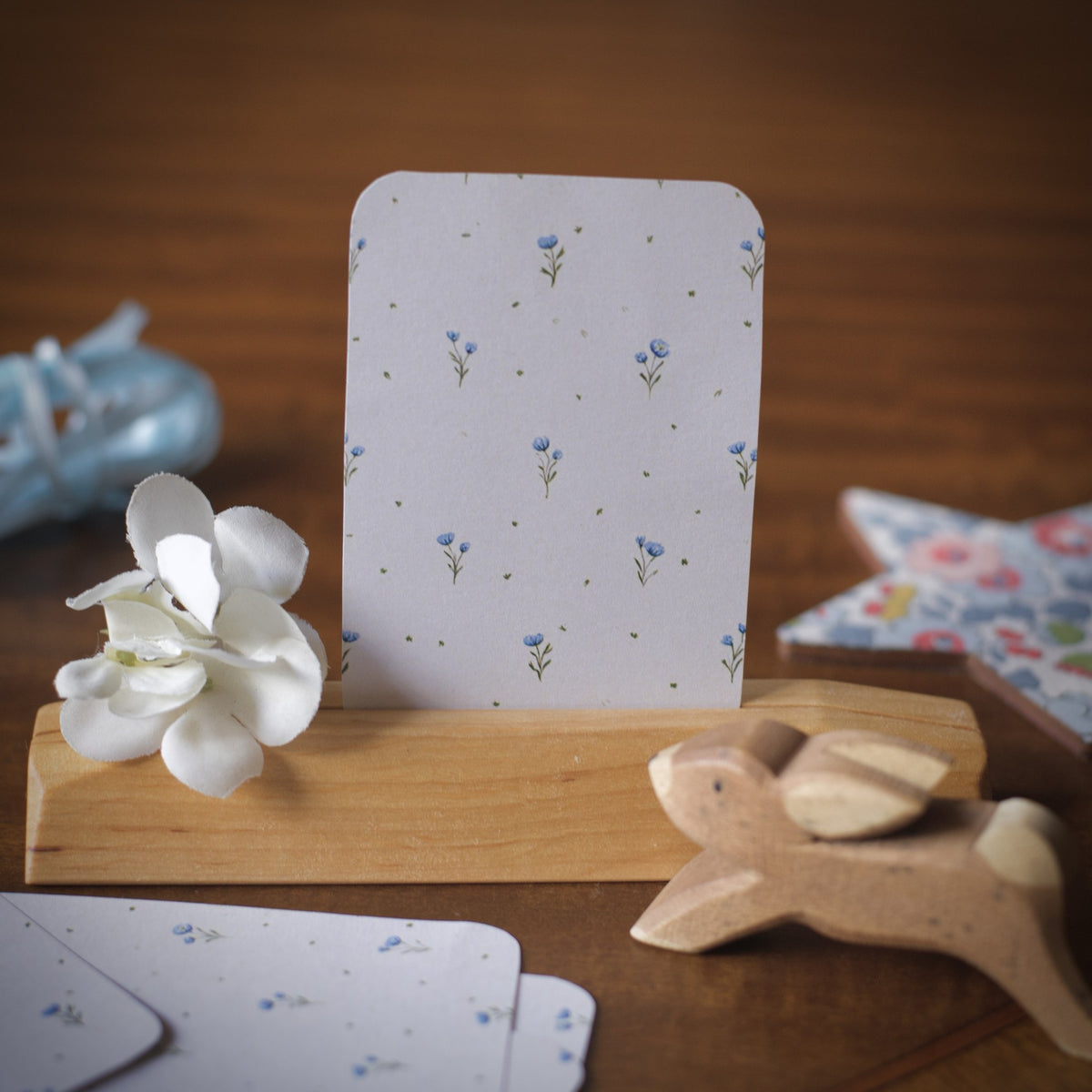 The blue flower pattern on the back of the summer affirmation cards