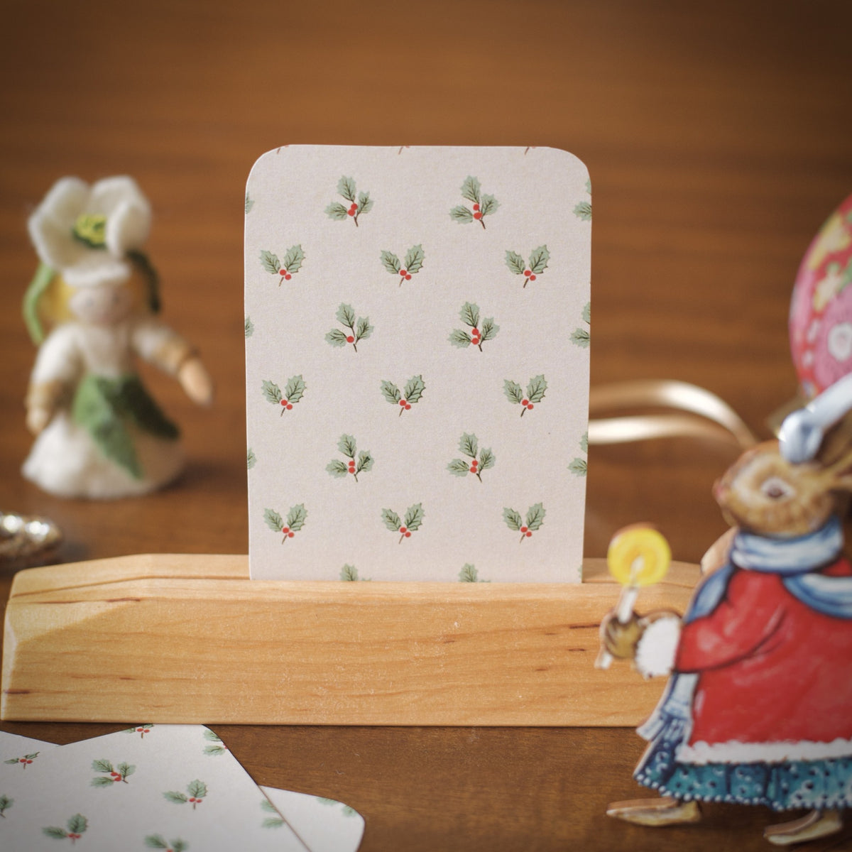 The holly pattern on the back of the winter affirmation cards